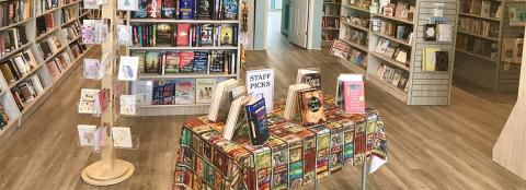 Books on a Table Standing Up