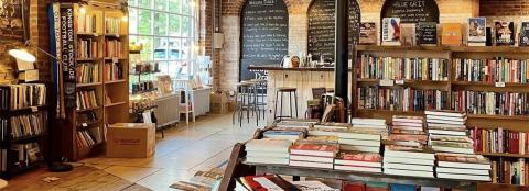 Bookshelves and a Table with Books