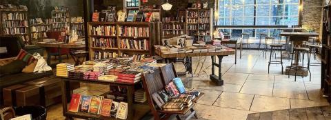 View of a Bookstore with tables on shelves and books