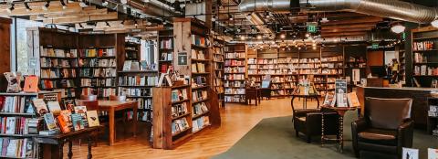 Shelves with books and an armchair